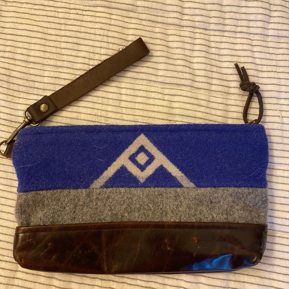 Local Portland OR designer.  Never used, fabric is wool with leather bottom